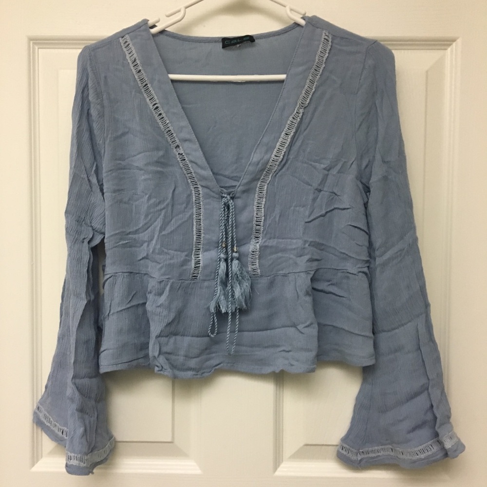 TASSLED BELL-SLEEVED BLOUSE
